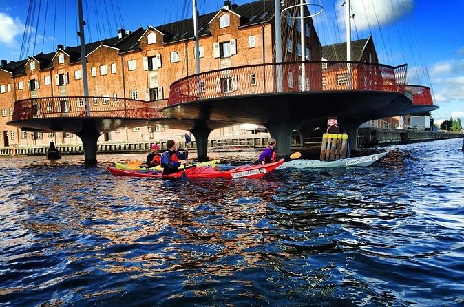 2 Hours Guided Kayak Tour in Copenhagen Harbor - Returning beneath pedestrian and bicycle bridges