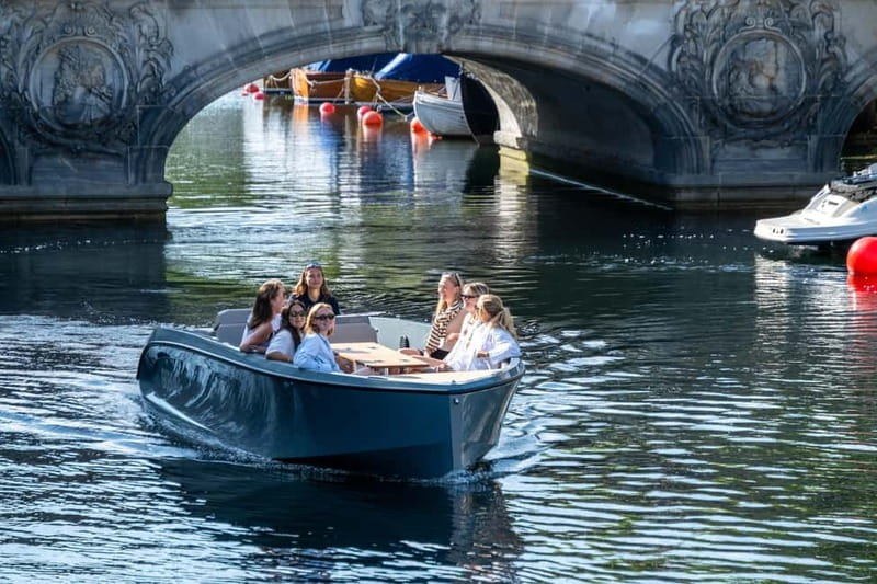 Copenhagen: 1 or 2-Hour Canal Tour in Silent Electric Boats - Staying warm on a Copenhagen harbor day