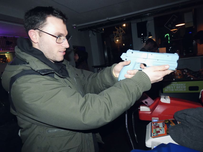 Copenhagen: Social Nightlife Pub Crawl with Shots & Games - Arcade games bring a welcome change