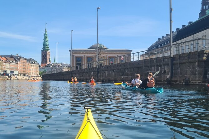 Kayak Tour in Copenhagen Harbor in May and September - Under the bridge and into the canals