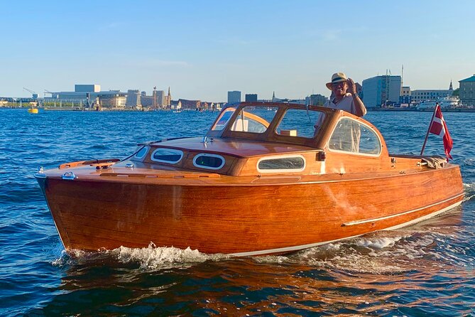 Private Copenhagen Boat cruise in Scandinavian mahogany boat - Why this private Copenhagen cruise feels different