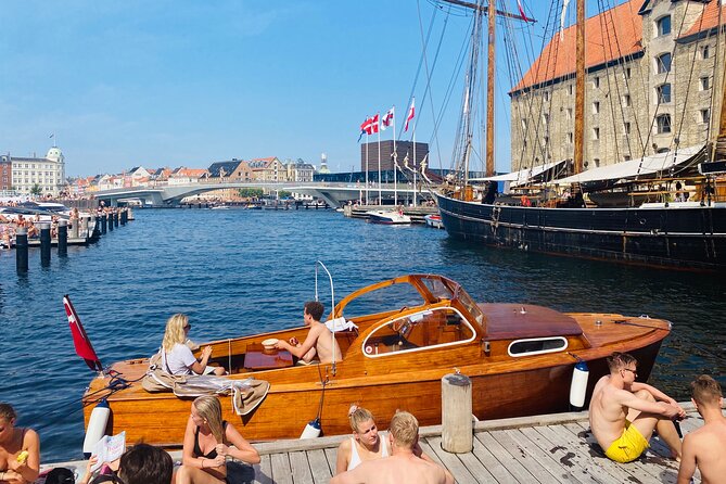 Private Copenhagen Boat cruise in Scandinavian mahogany boat - Copenhill, Bjarke Ingels, and modern Danish design
