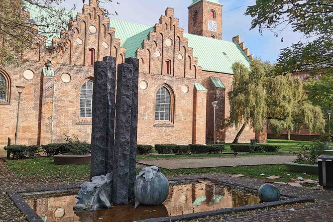 The Ancient Viking Stronghold of Aros: A Self-Guided Audio Tour in Aarhus - The Latin Quarter, Church of Our Lady, and old city texture